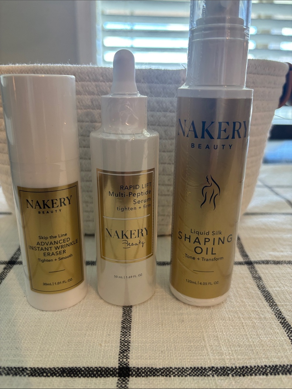 Nakery Beauty Liquid Silk Shaping Oil & Rapid Lift Serum — Gold/White